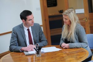 Lee advising a client
